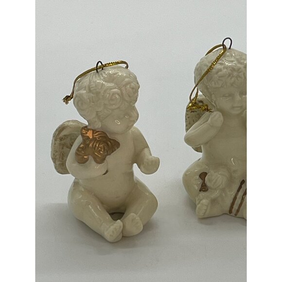 Set of 4 Ceramic White White Angel Ornaments with Gold Instruments and Wings 2" - Picture 5 of 8